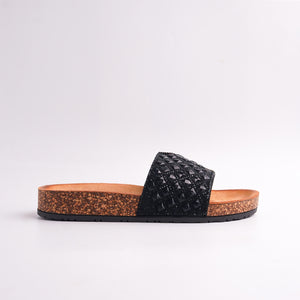 Backside view of black Studded Slides showing cork sole and platform height, casual summer sandals.