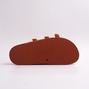 Bottom view of Brown Triple-Strap Sandal showing the ridged anti-slip sole.