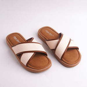 Pair of brown and beige sandals on a white background