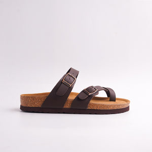Anti-slip traction pattern on the dark brown rubber sole of Cork Footbed Sandals.