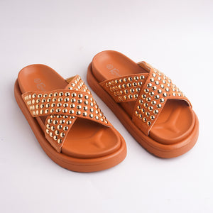 layna Fashion pair of Terracotta Orange Studded Cross-Strap Slides for women, chunky platform style.