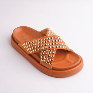 Ridged, anti-slip sole of Terracotta Chunky Slides, bottom view.