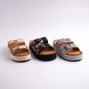 Three sandals in different colors on a white background