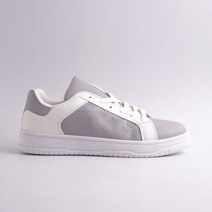 Gray and white sneaker with brand logo on a light gray background