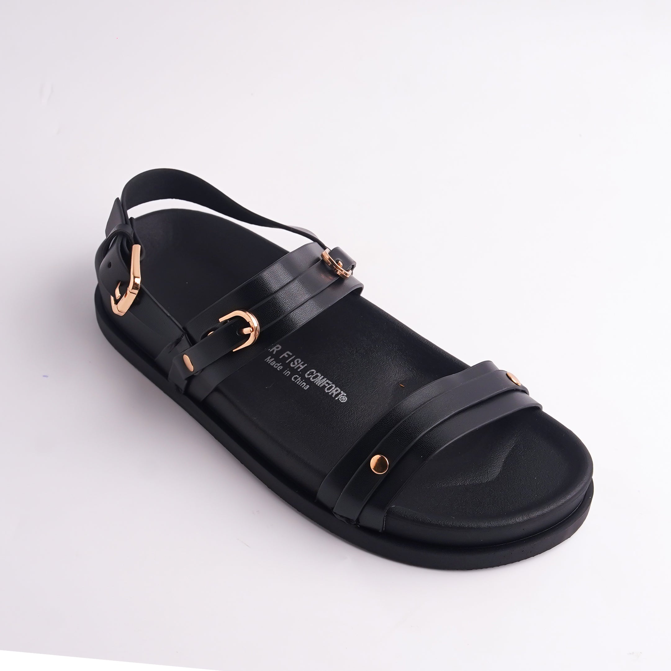 Close-up of Black Water Fish Comfort sandal showing the double strap and gold studs.