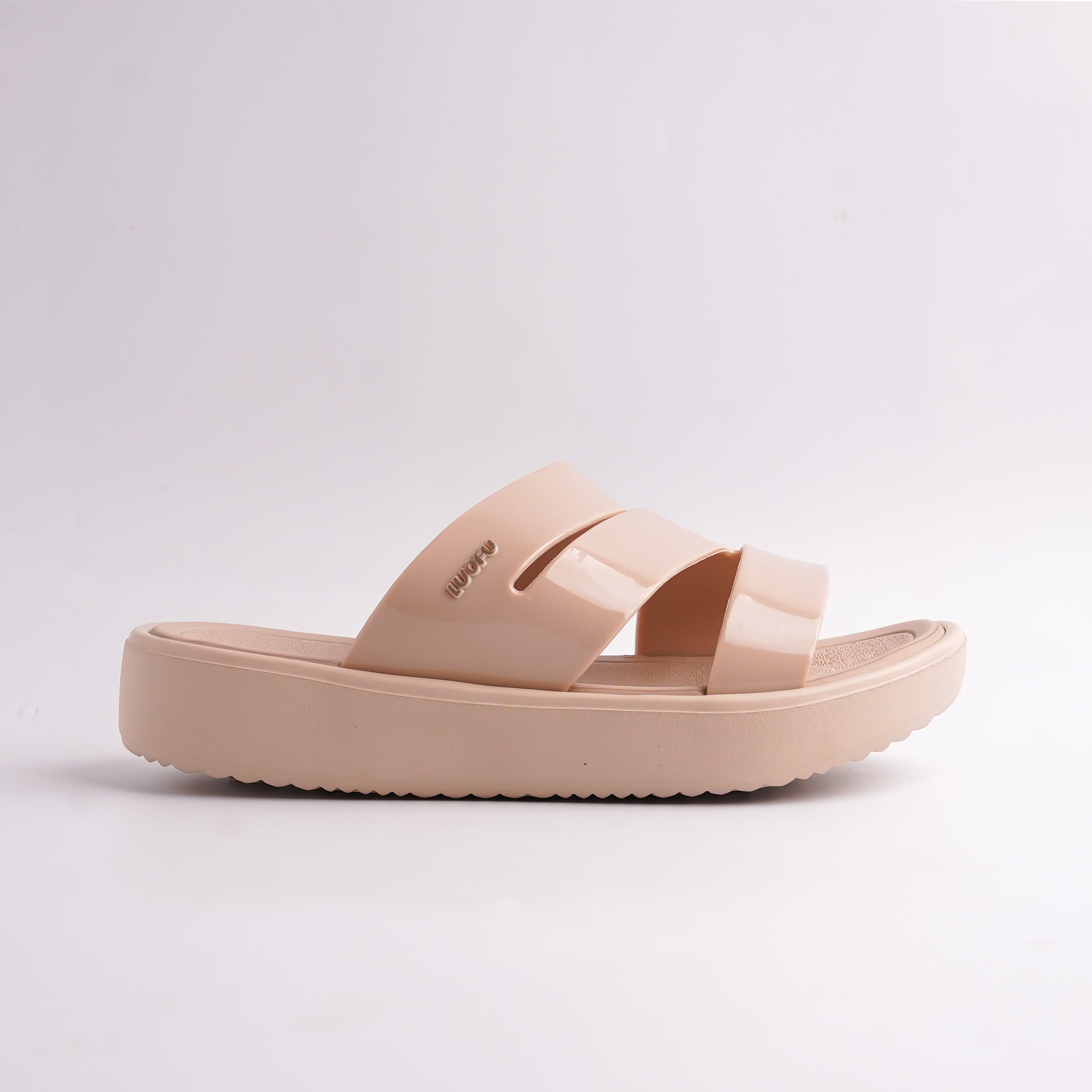 Side view of Beige Double Buckle Cloud Slide showing the thick, cushioned EVA sole.