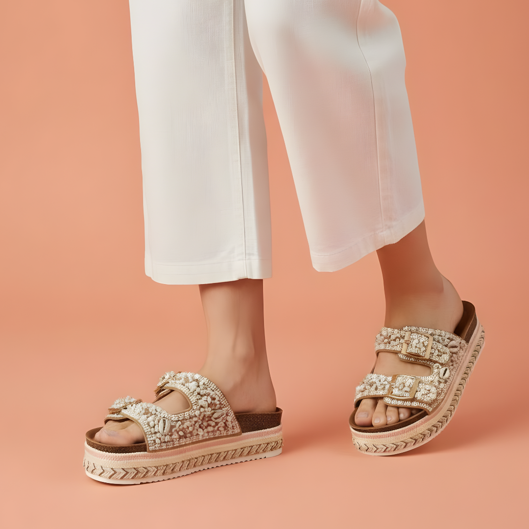 Side view of Alayna Fashion ivory house shoes showing the flexible soft sole.