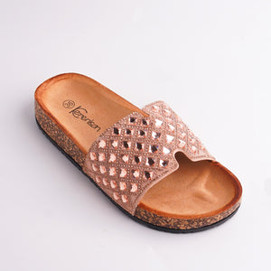 Close-up of Rose Gold Studded Slide showing cork footbed and Kerenson brand detail.