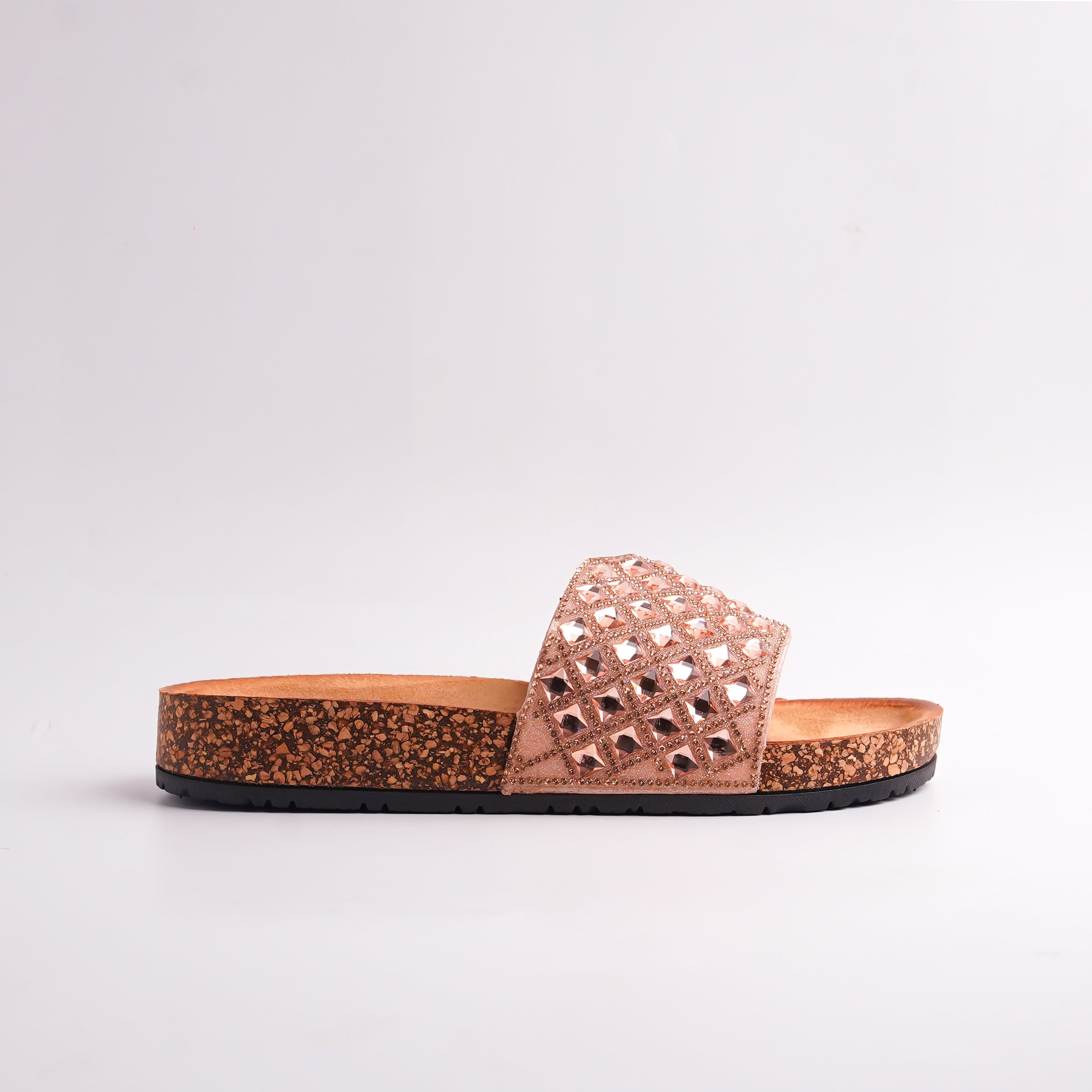 Side view of Rose Gold Studded Slides showing cork sole and platform height, casual summer sandals.
