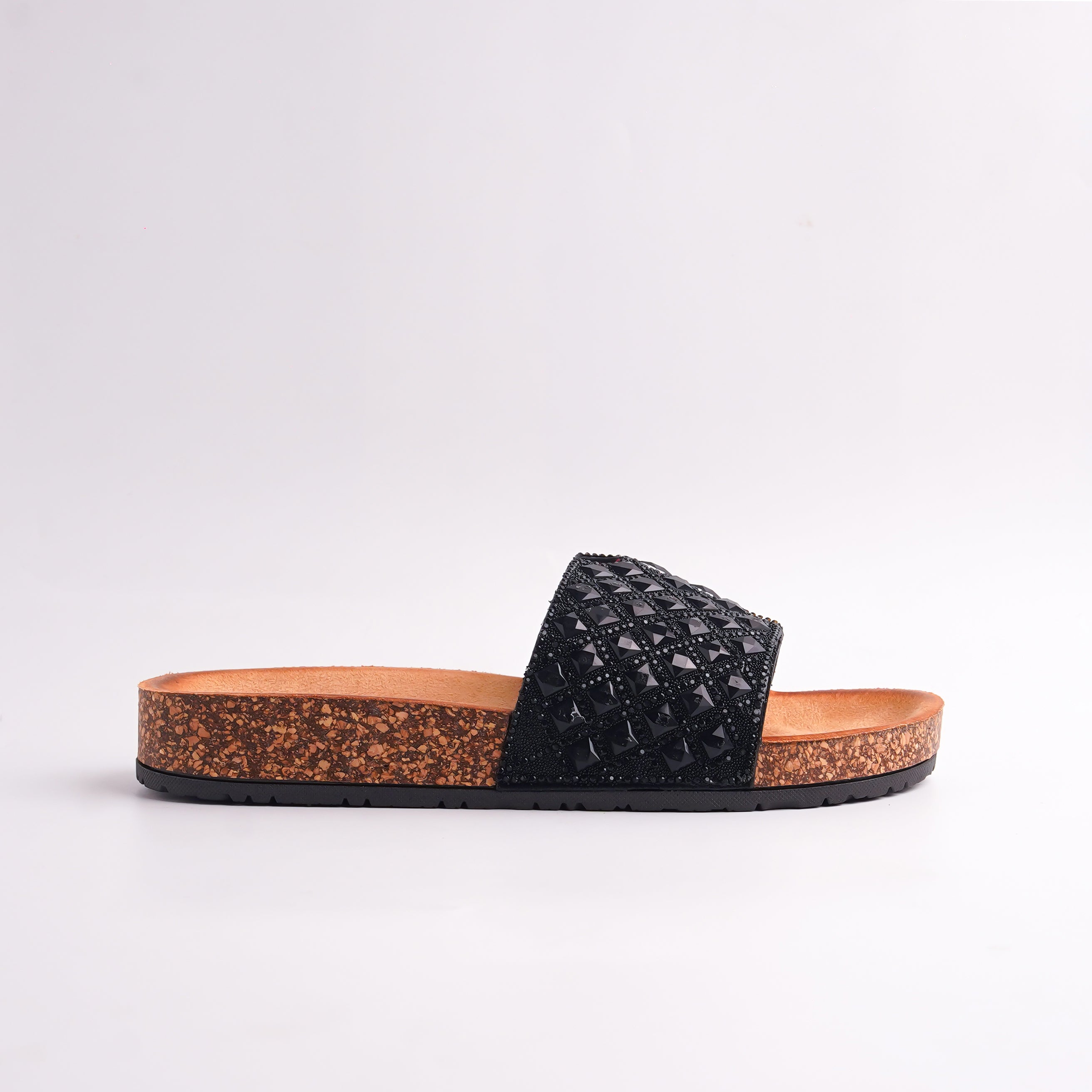 Backside view of black Studded Slides showing cork sole and platform height, casual summer sandals.