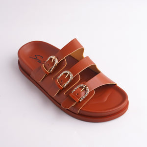 Close-up of Brown Triple-Strap Slide showing the rhinestone buckle details.