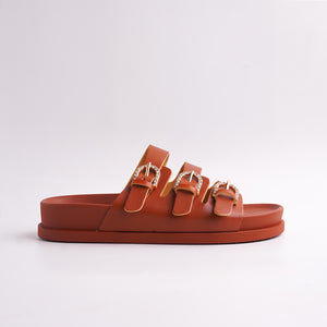 Side view of Brown Triple-Strap Sandal showing the ridged anti-slip sole.