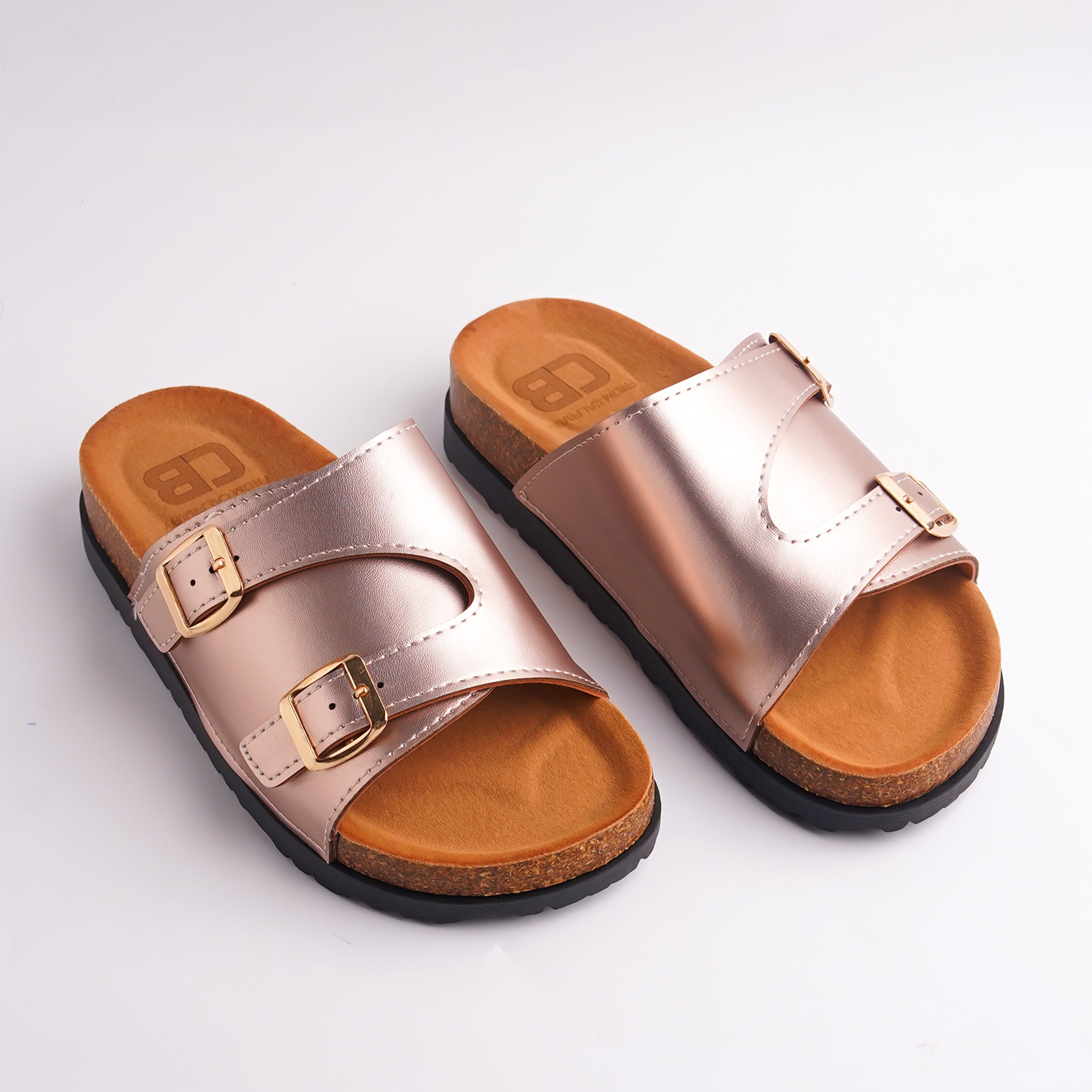 Pair of Pink Double Buckle Cork Slides with black sole.