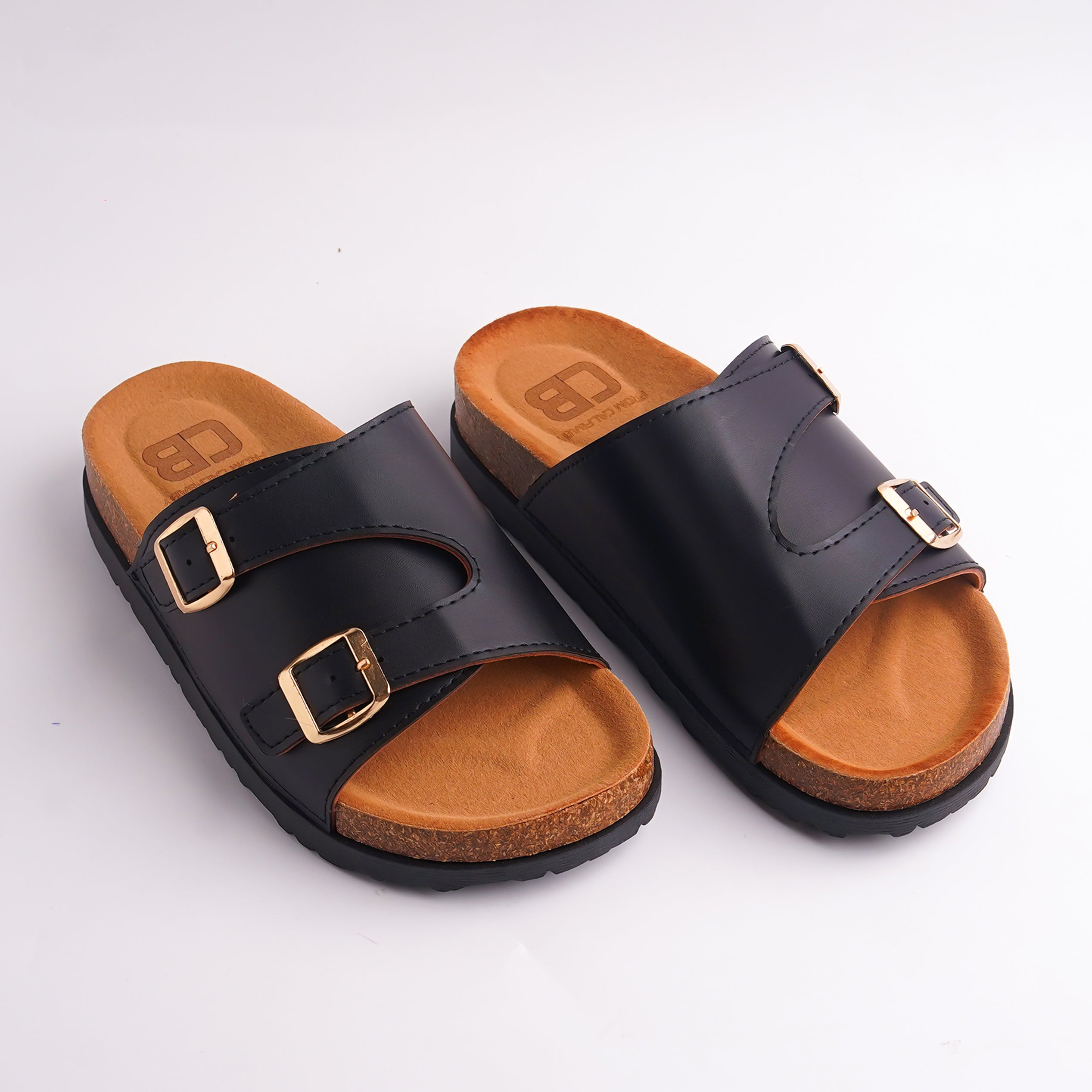 Pair of Rose Gold Double Buckle Cork Slides with black sole.