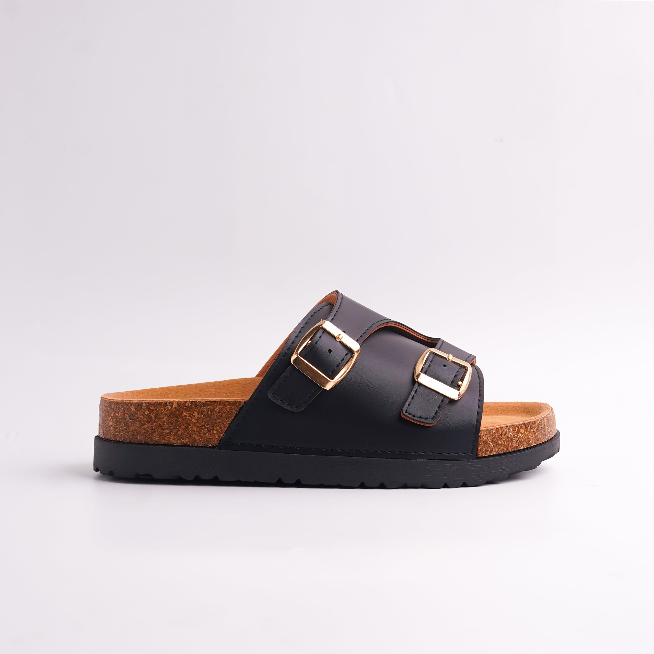 Side profile of Rose Gold Cork Slide showing the visible cork footbed layer.