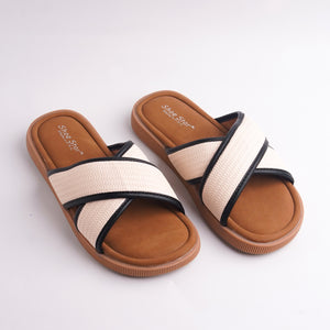 Pair of sandals with beige and brown straps on a white background