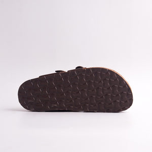 backside view sof Dark Brown Cork Footbed Sandal showing the Nicola Natural Antibacterial branding and suede-look lining.