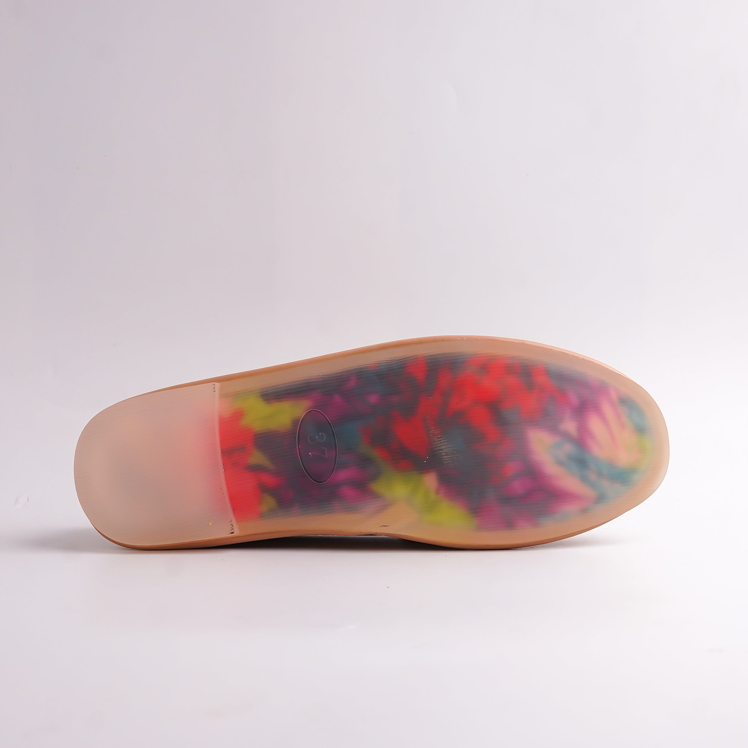 Backside profile of Nude Tan Loafer showing smooth leather-look upper and flat heel, elegant flats.