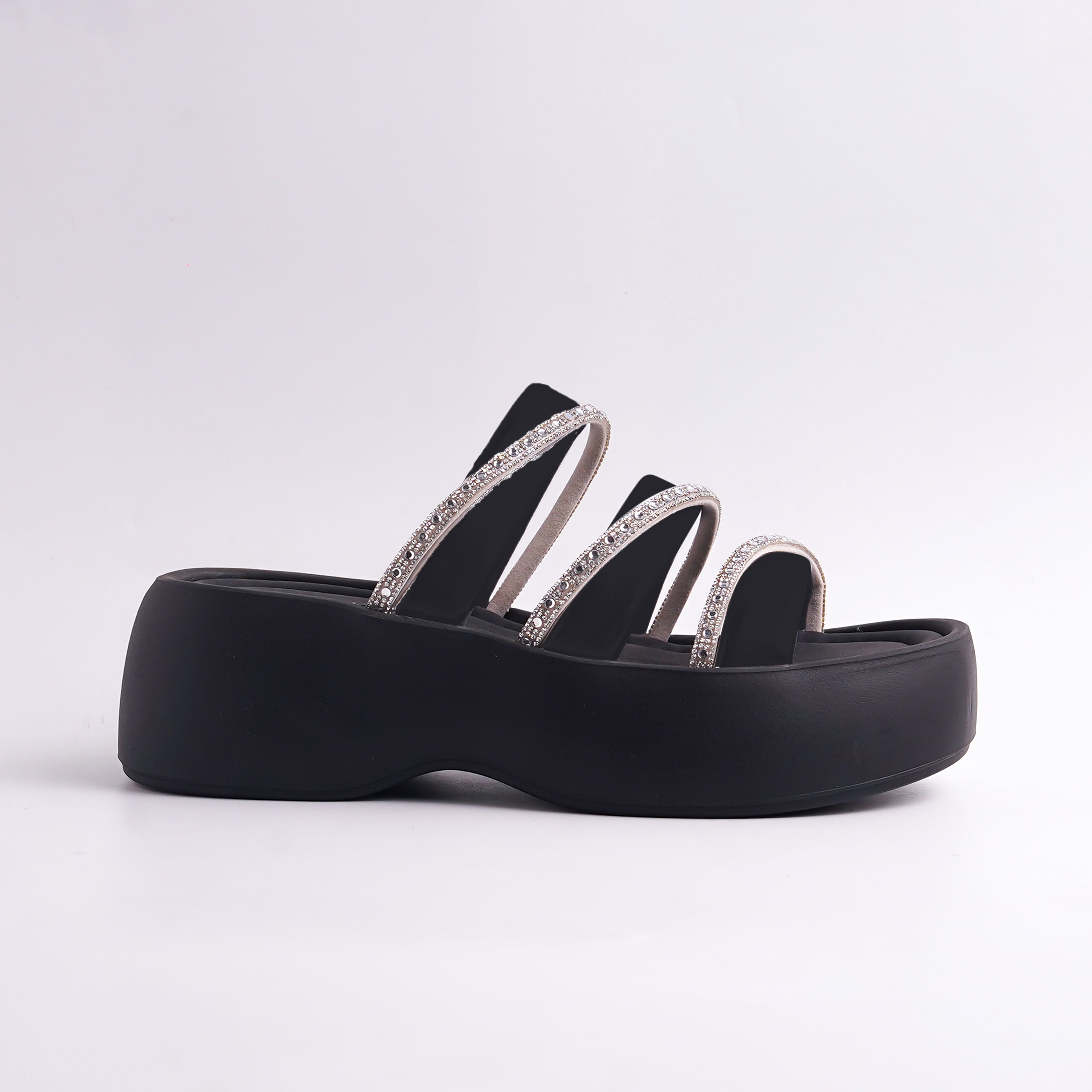 Black sandal with rhinestone straps on a white background