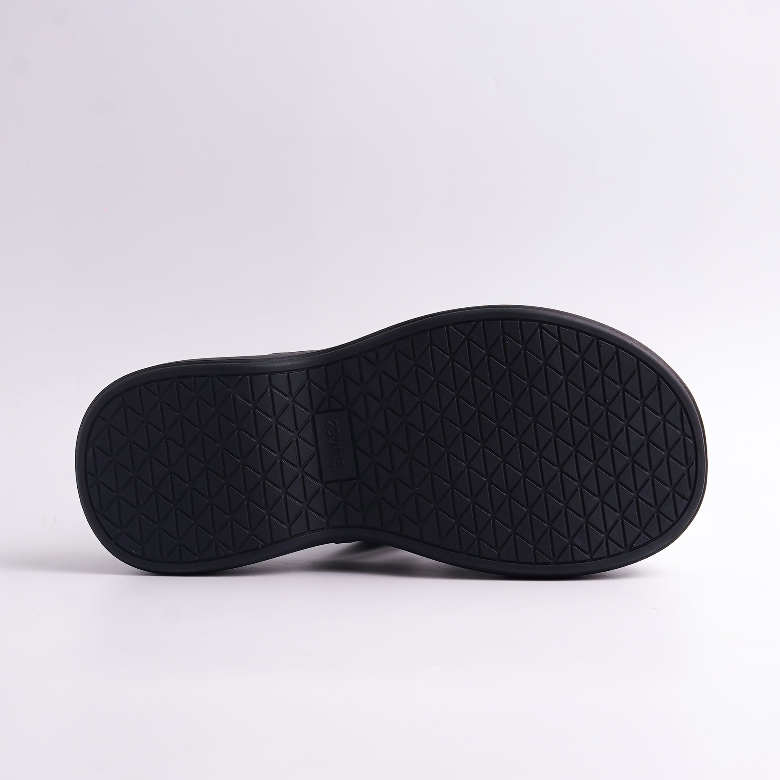 Black shoe sole on a white background