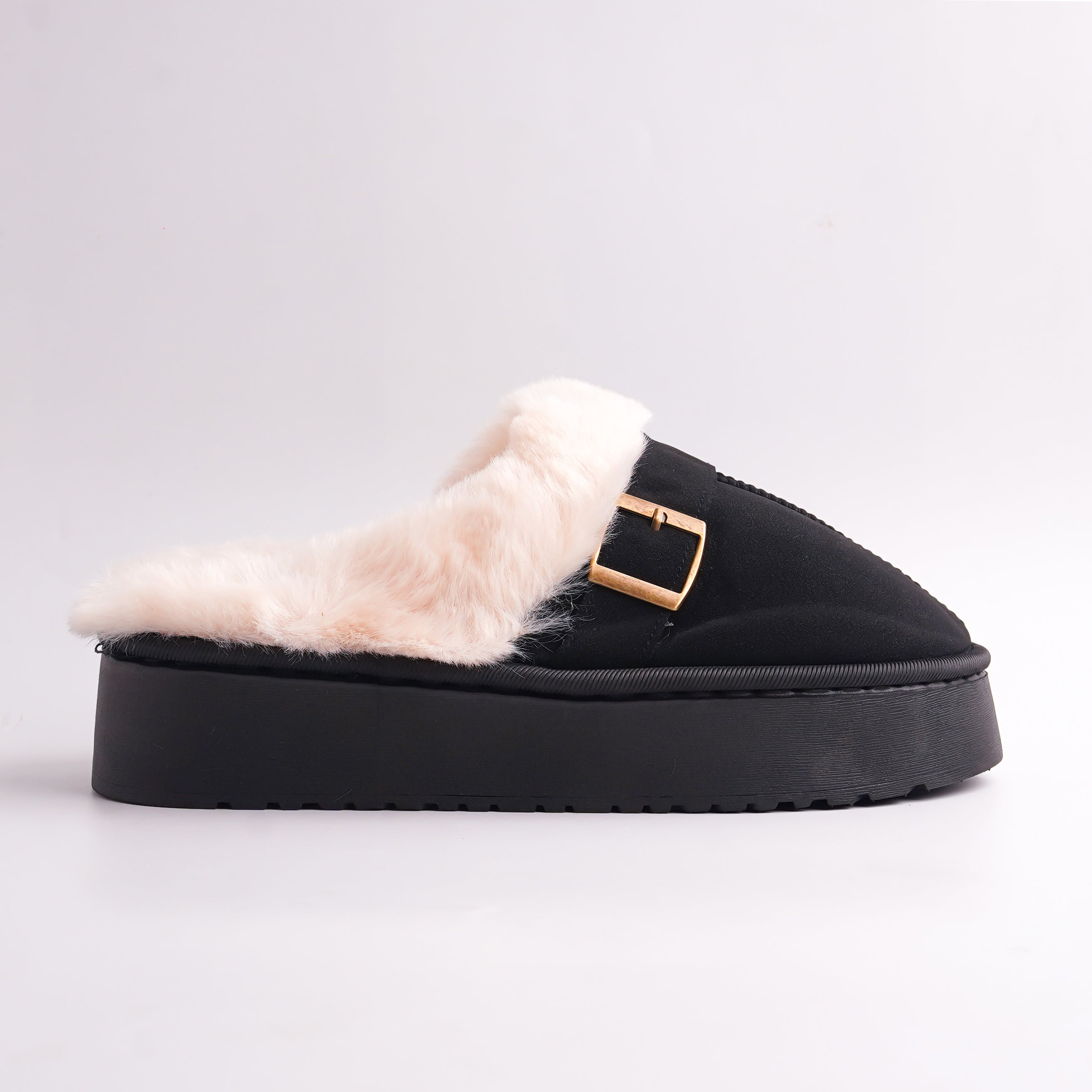 Black anti-slip, heavy-tread sole of Faux Fur Mules, bottom view.