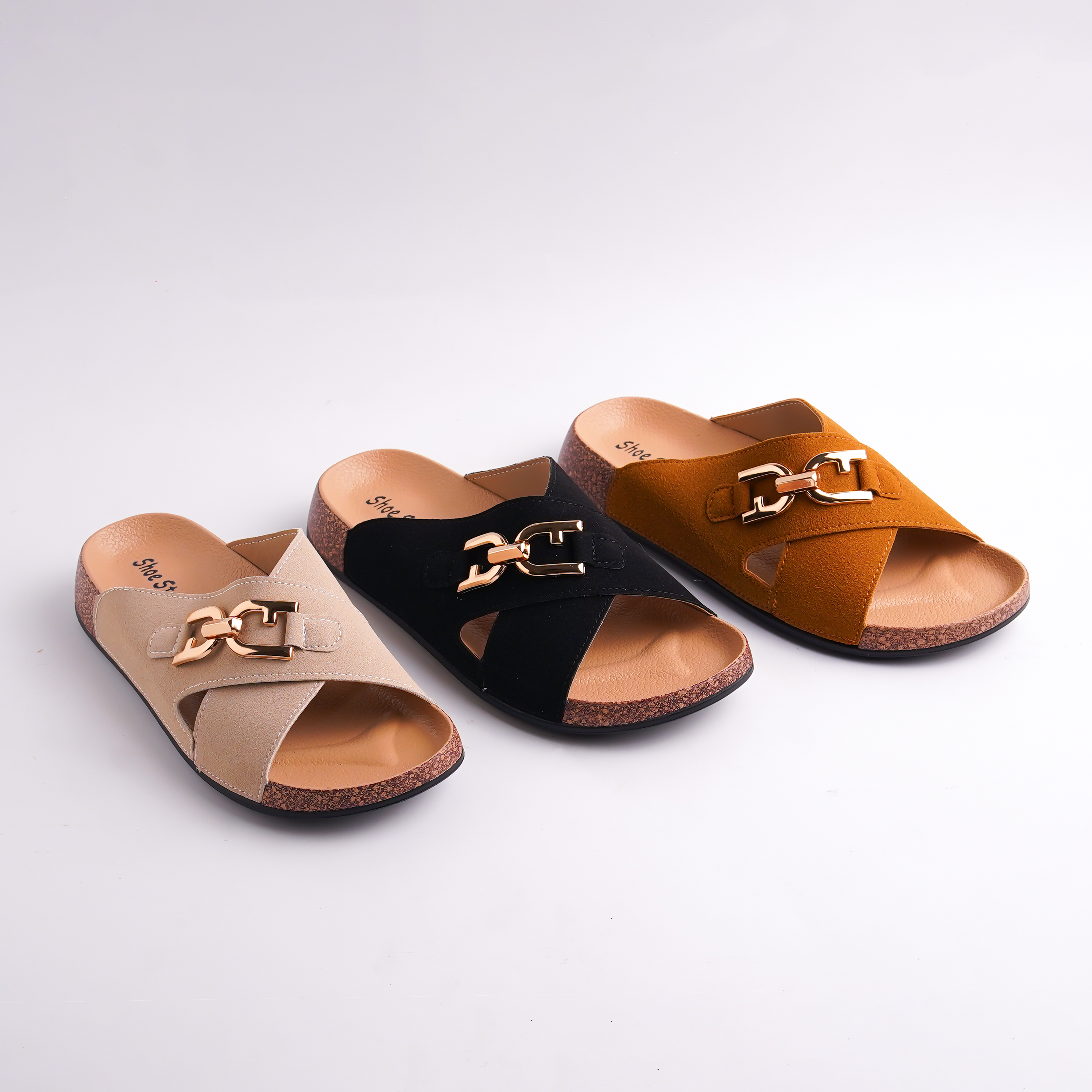 Three pairs of open-toe sandals in beige, black, and brown on a light gray background.