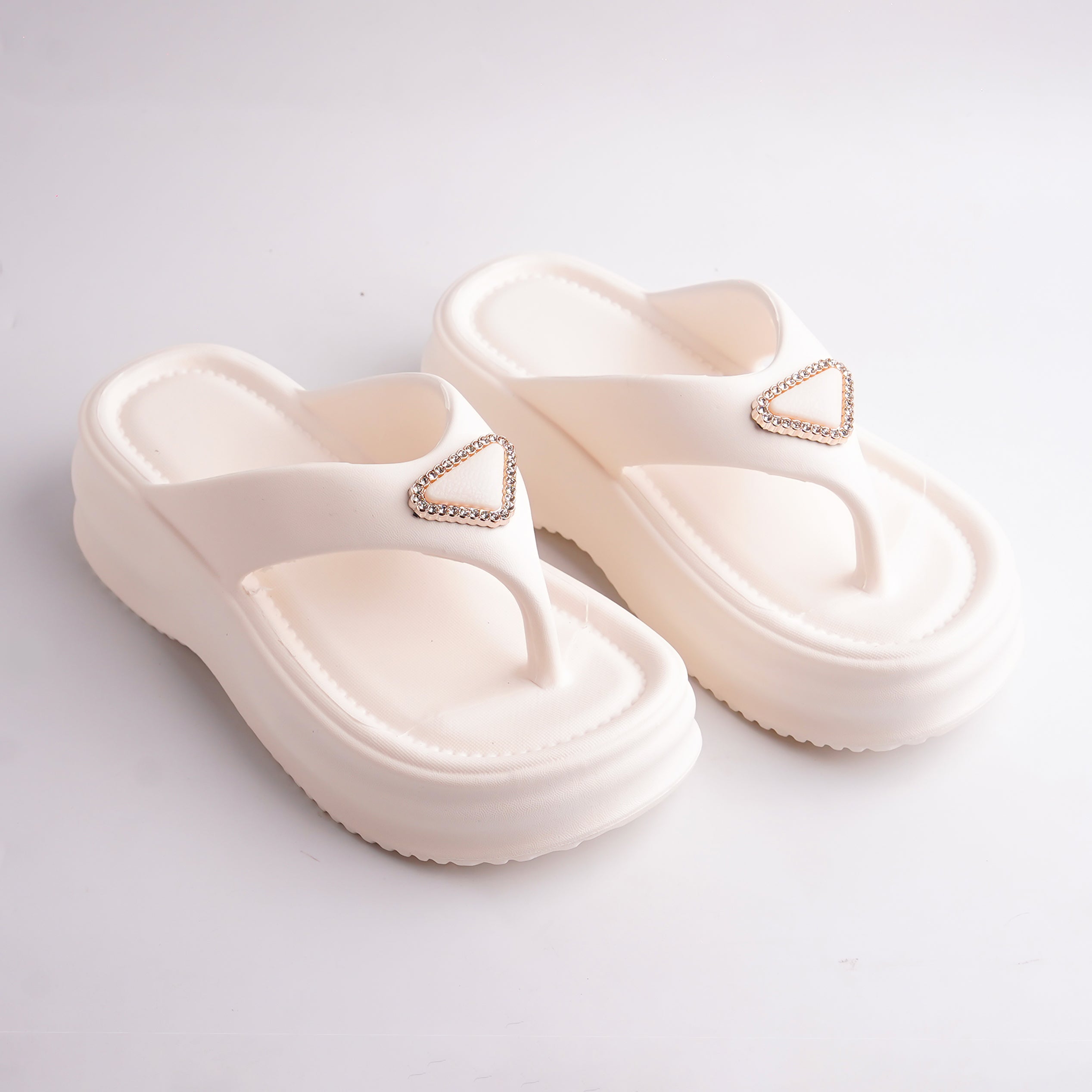 Pair of Cream Platform Thong Sandals with a triangular rhinestone embellishment.