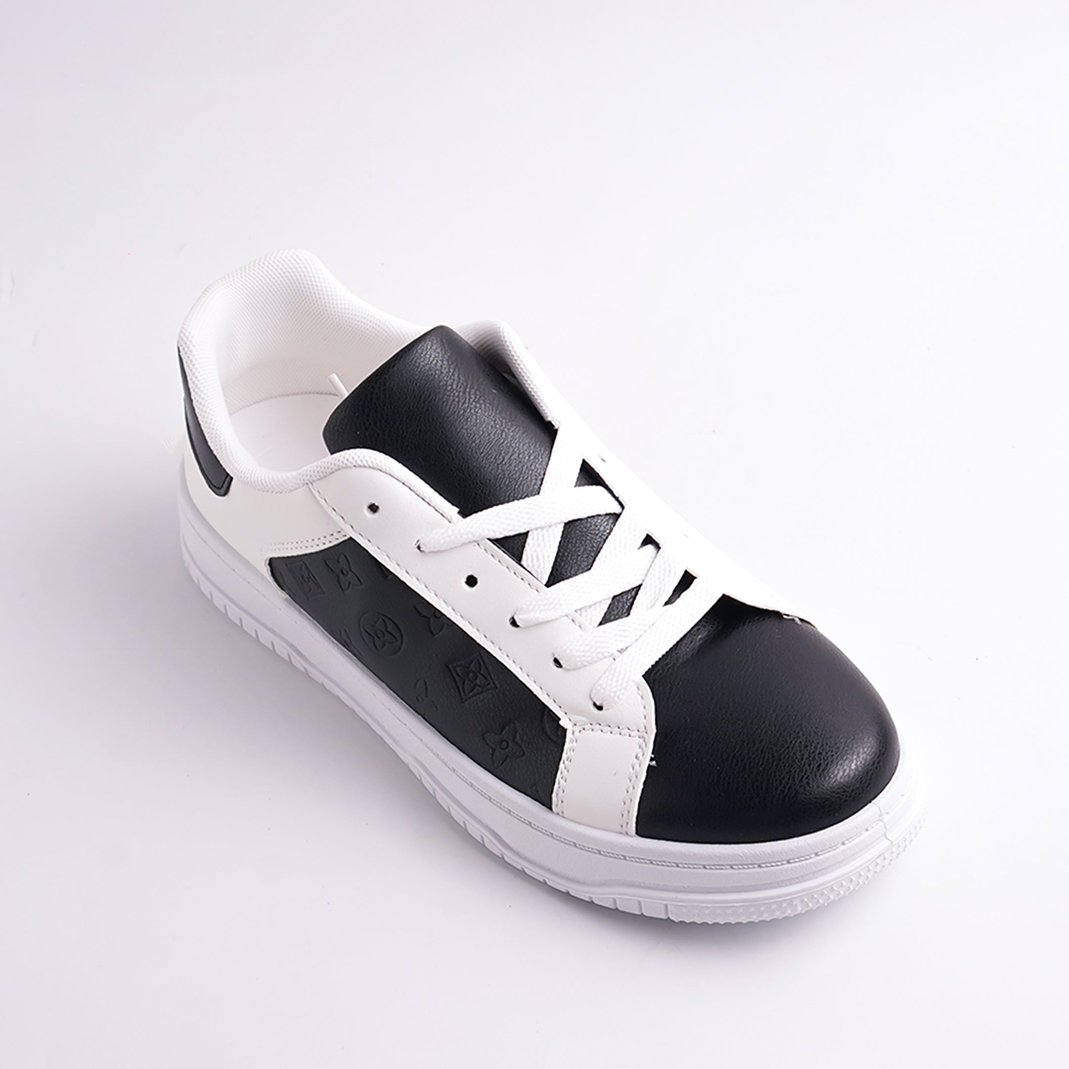 Black and white sneaker on a light gray background