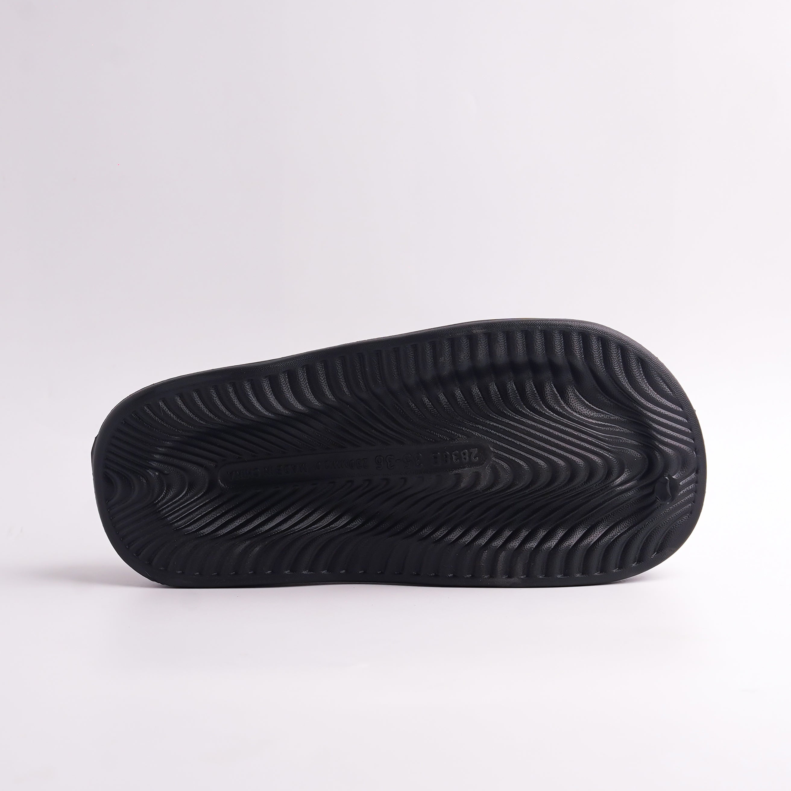 Bottom view of Black Platform Slide showing the patterned anti-slip sole.