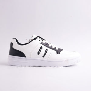 White sneaker with black accents on a light gray background