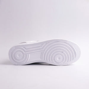 White sneaker sole on a light gray background