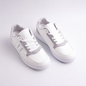 White sneakers with gray accents on a light gray background