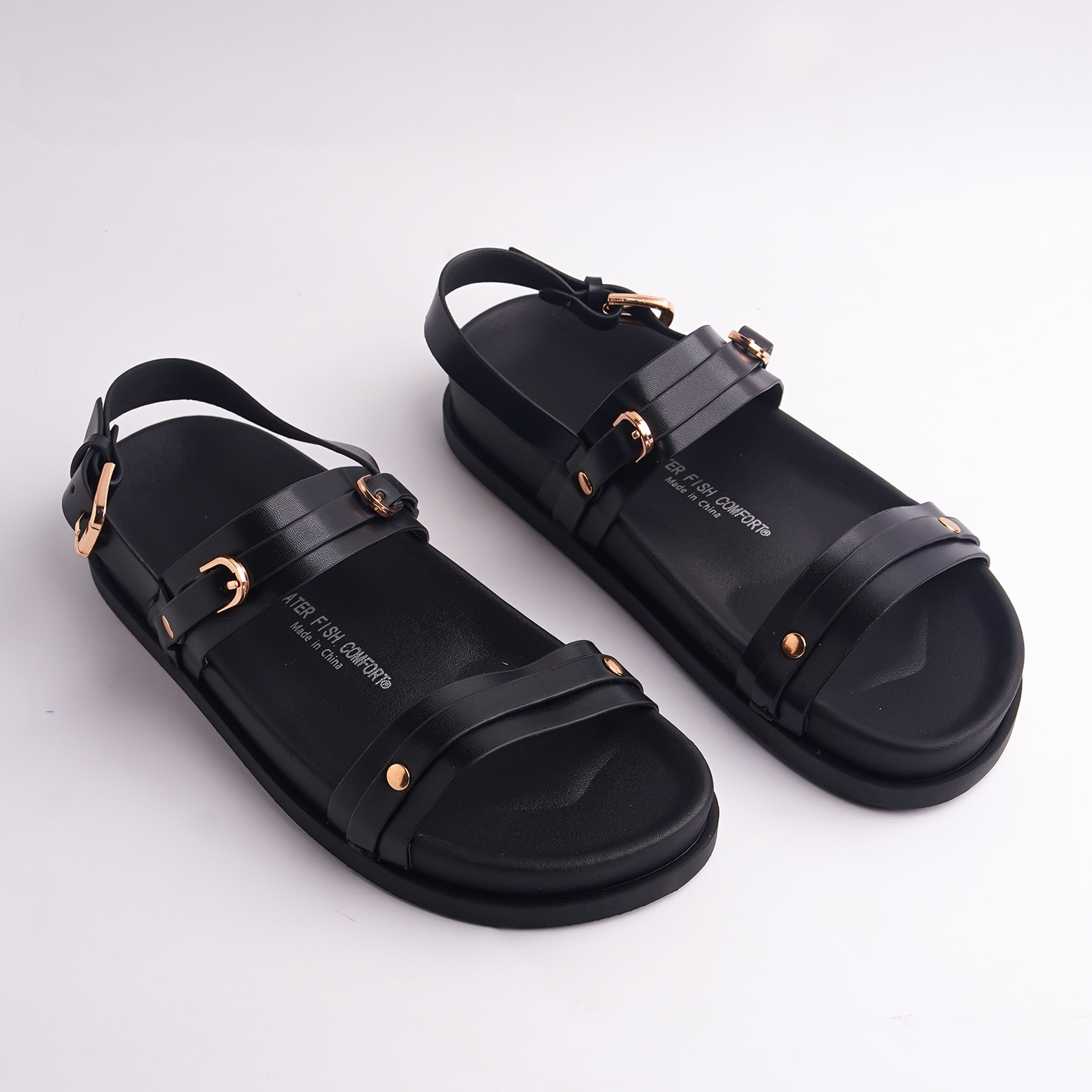Pair of Black Multi-Strap Comfort Sandals with gold buckle hardware on a white background.