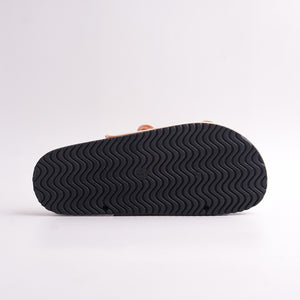 Bottom view of the Orange Woven Cork Sandal showing the black outsole and cork detailing.