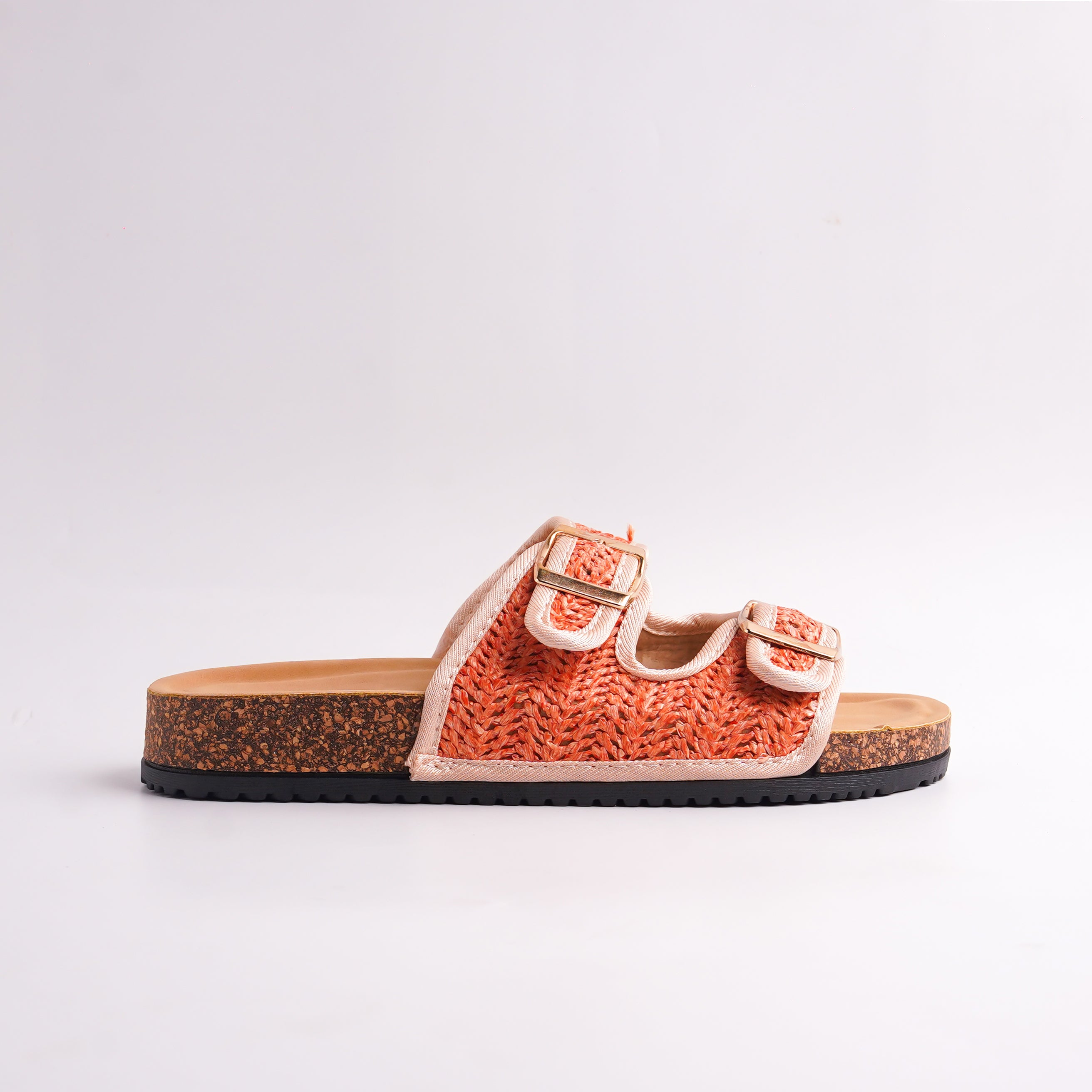 Side view of the Orange Woven Cork Sandal showing the black outsole and cork detailing.