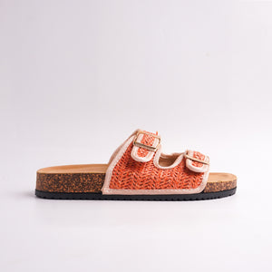 Side view of the Orange Woven Cork Sandal showing the black outsole and cork detailing.