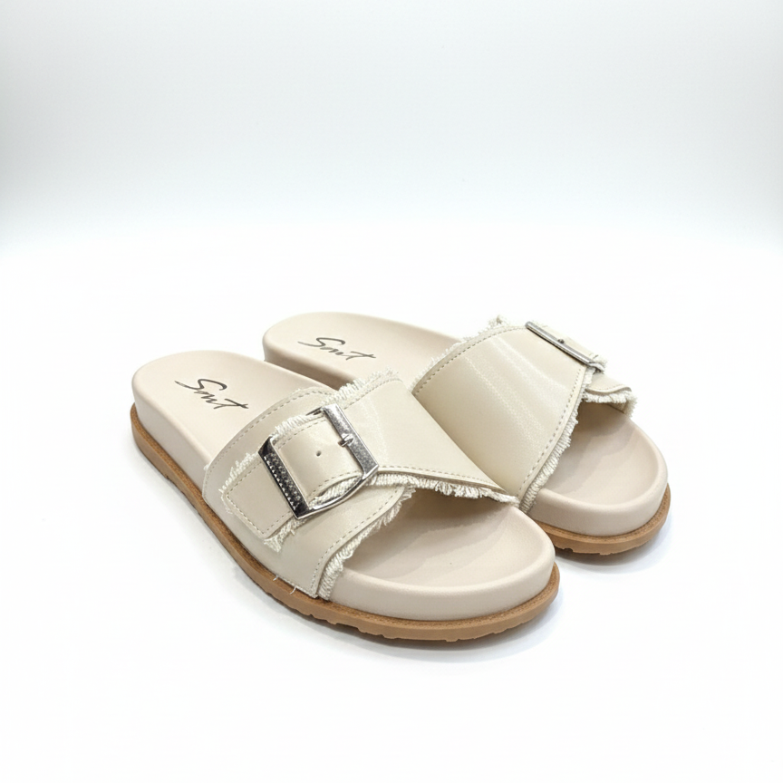 Pair of beige sandals with a buckle on a white background