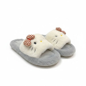 Pair of slippers with a cartoon character design on a white background