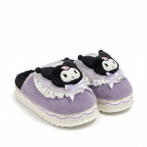 Pair of purple slippers with panda face design on a white background