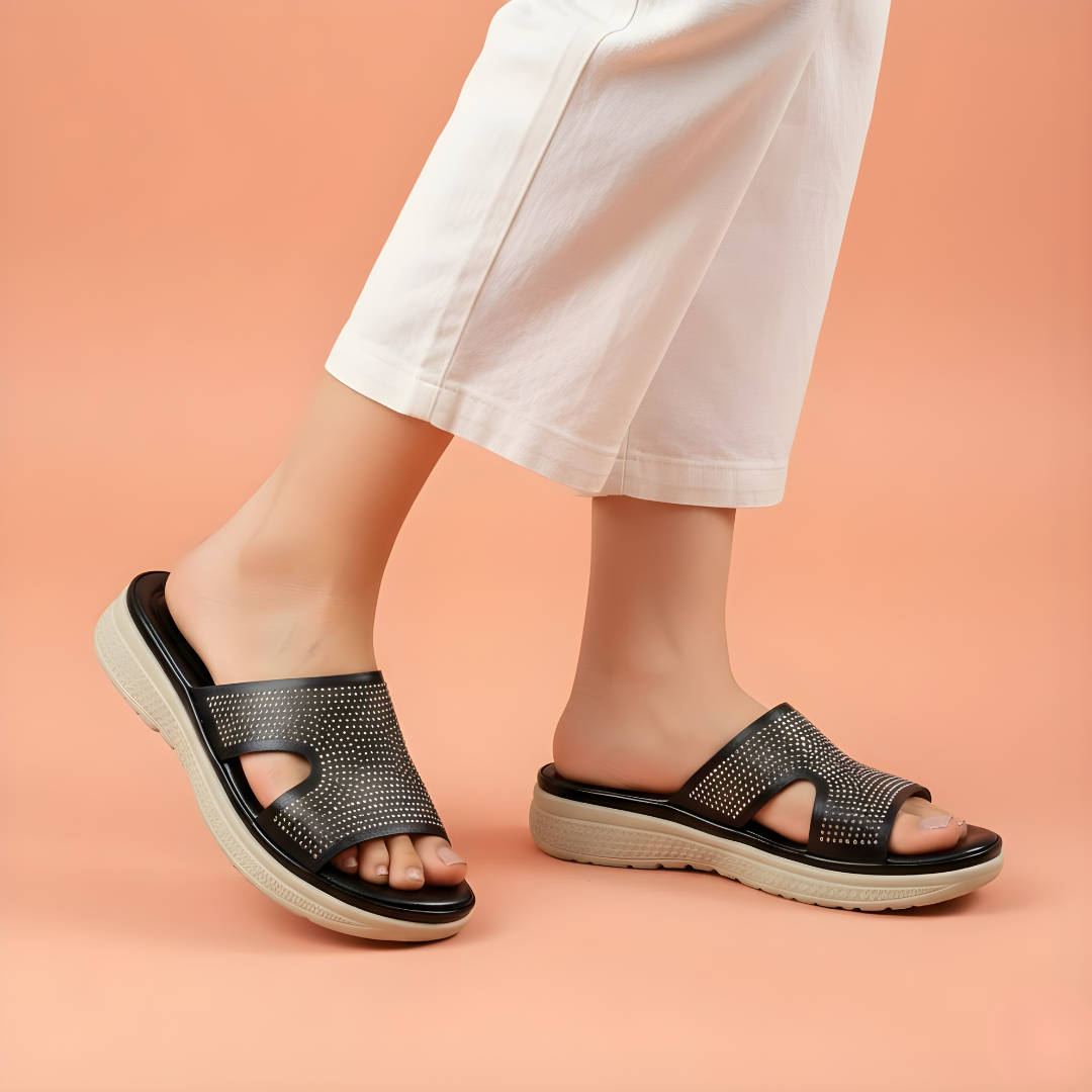 Midnight black house slipper for silent indoor movement.